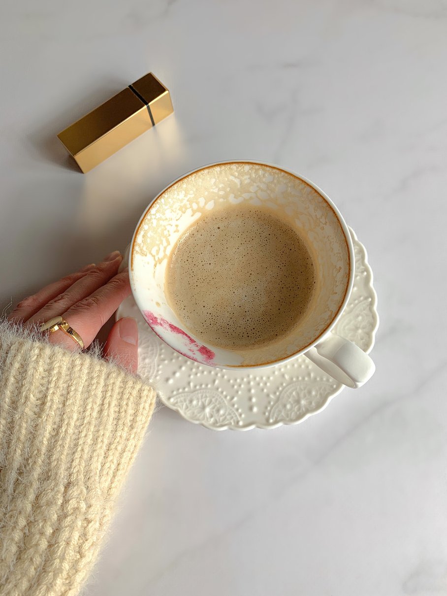 A Cup of Coffee on a White Table