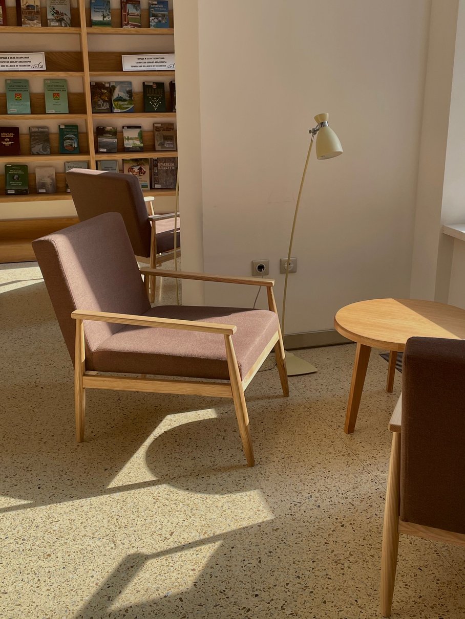 Brown Wooden Chair Beside Table